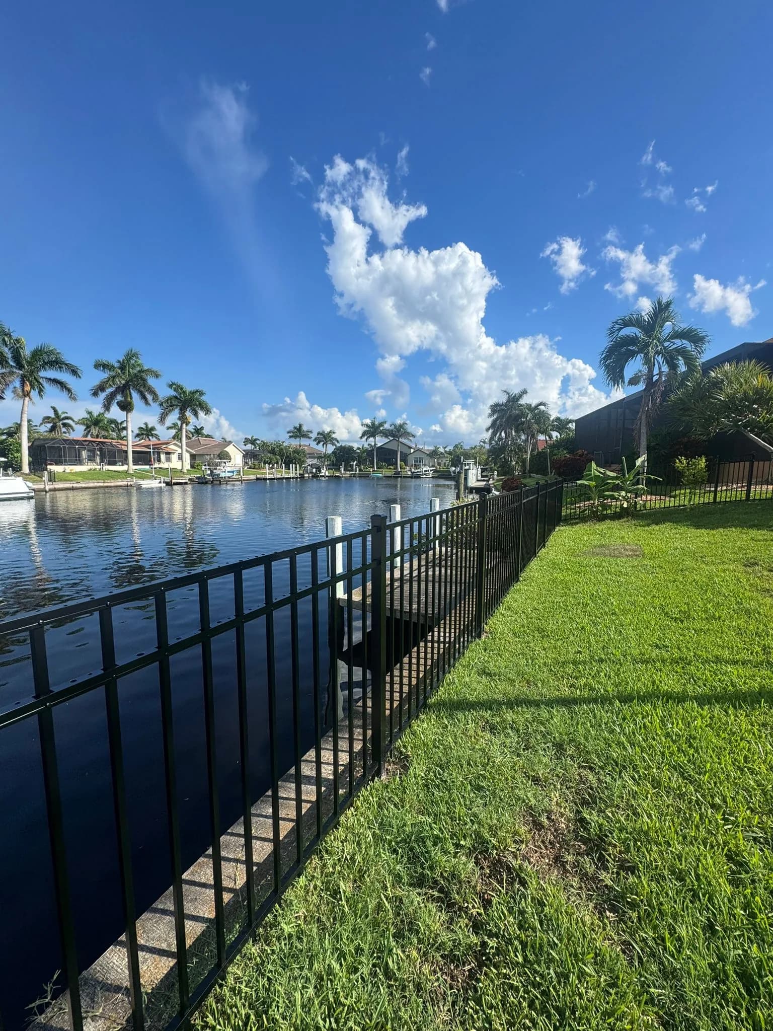 Aluminum fence near a Southwest Florida waterfront property