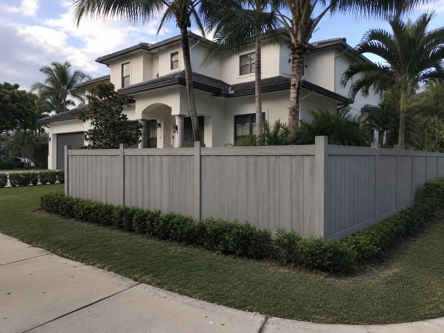 Composite fence in front of a luxury Florida home