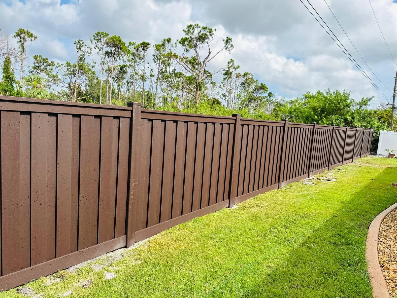 Composite privacy fence installation